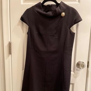 black a line dress with pearl detail